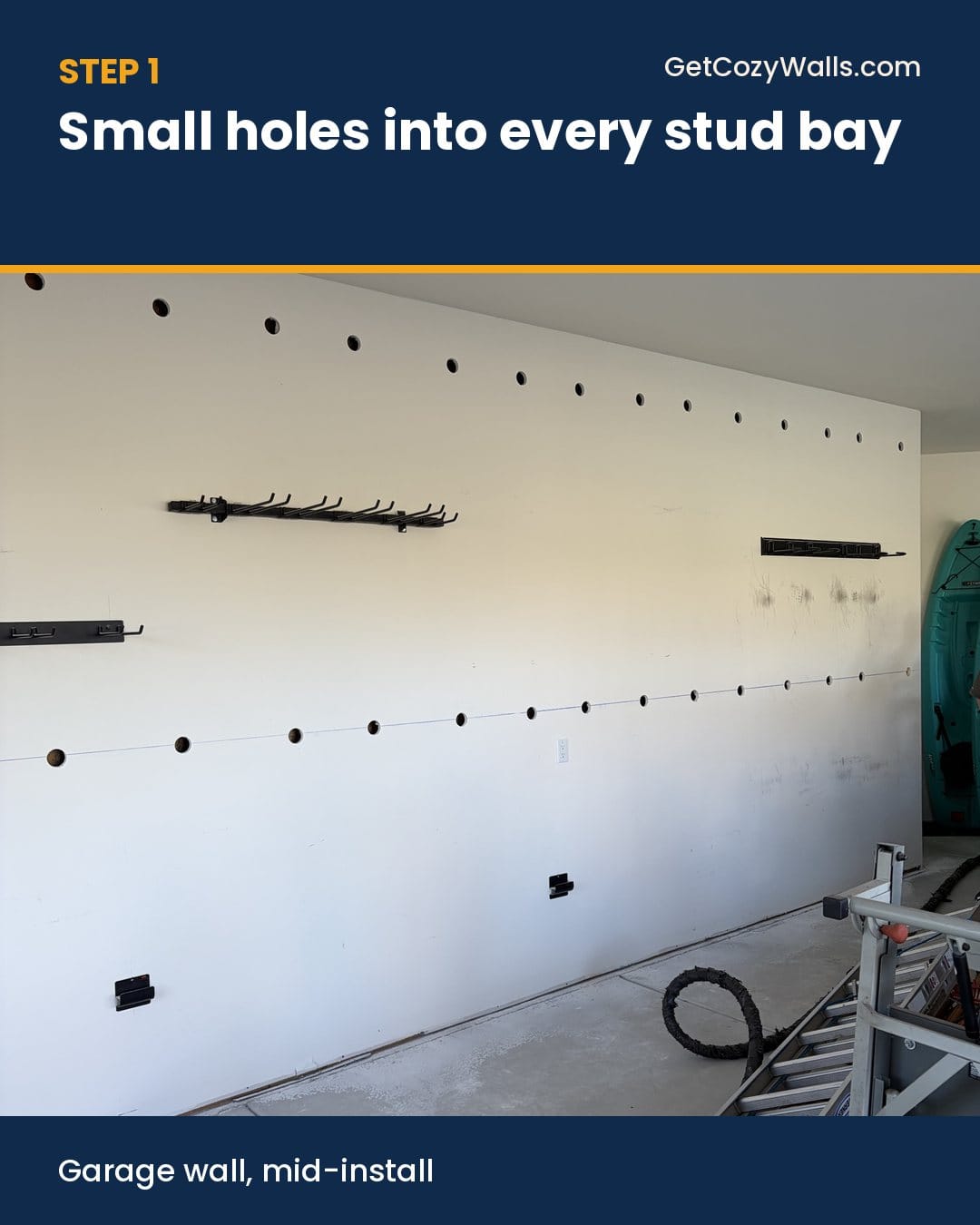 Small injection holes drilled into each stud bay of a garage wall during a Cozy Walls foam insulation install